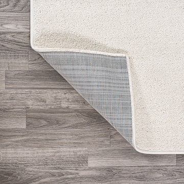 Haze Solid Low-pile Area Rug Cream
